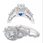 Load image into Gallery viewer, Halo 925 Sterling Silver 2 Pc Ring Set w/5.5mm Round Ctr Pear Sides 5A CZ
